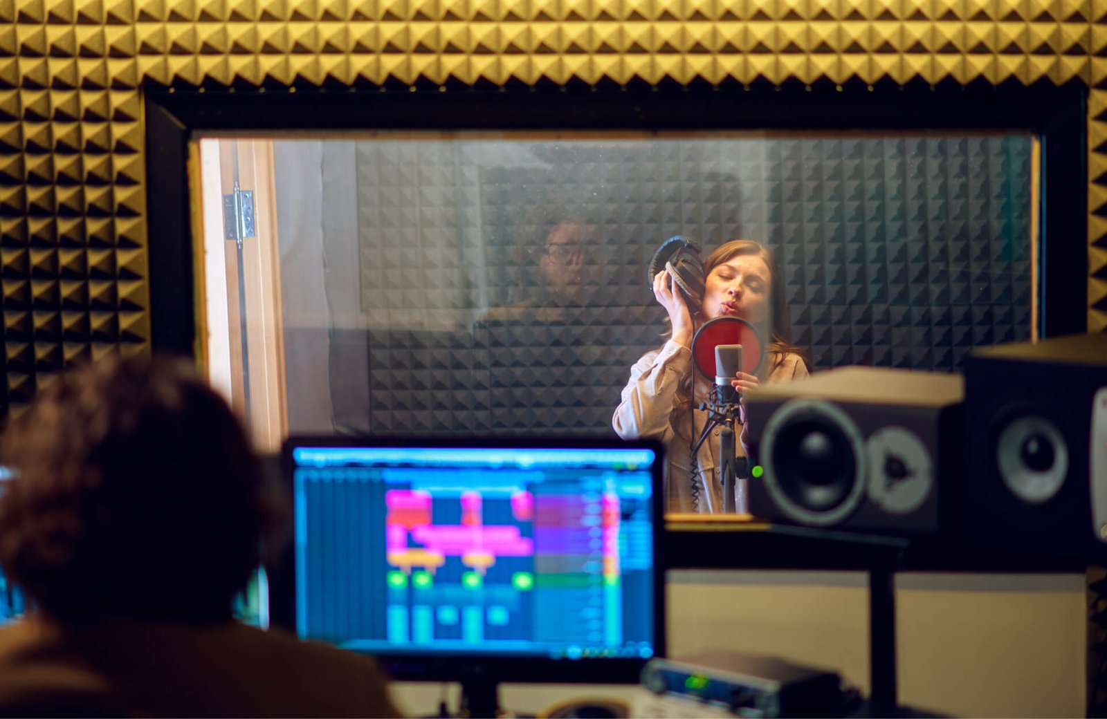 male-musician-and-female-singer-recording-studio-01.jpg